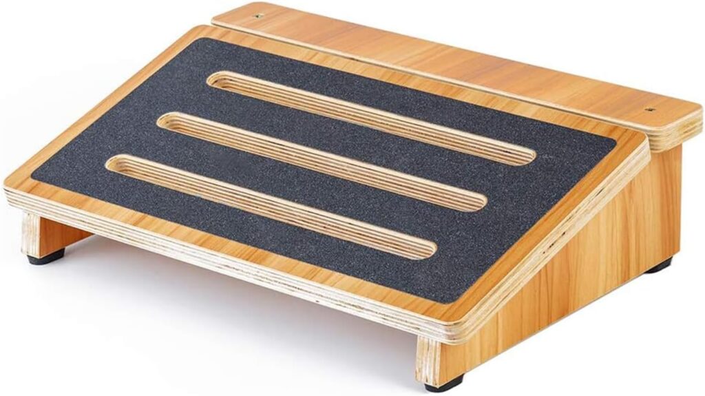 Compact StrongTek wooden footrest for a small desk setup
