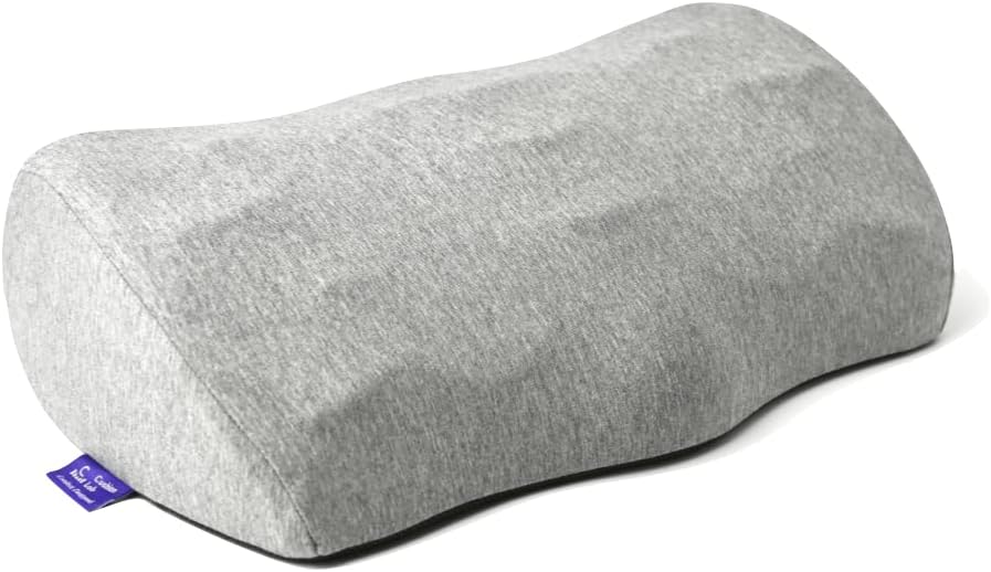 Grey memory foam footrest with raised massage ridge pattern for under a desk