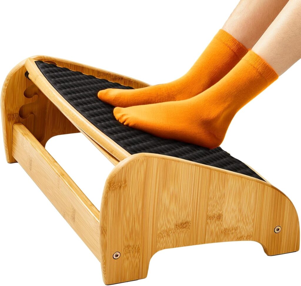 HUANUO bamboo under desk footrest with pebble massage texture and adjustable height settings